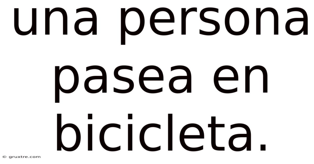 Una Persona Pasea En Bicicleta.